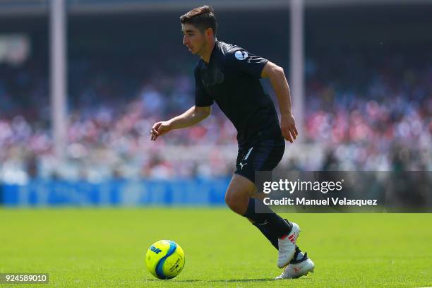 Isaac Brizuela of Chivas drives the ball during the 9th round match between Pumas UNAM and Chivas as part of the Torneo Clausura 2018 Liga MX at...