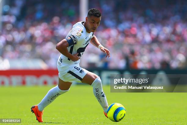 Pablo Barrera of Pumas drives the ball during the 9th round match between Pumas UNAM and Chivas as part of the Torneo Clausura 2018 Liga MX at...