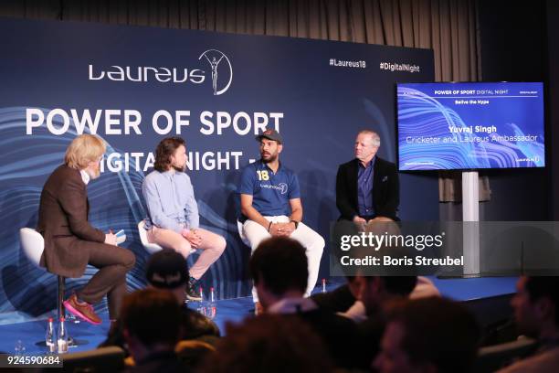 Yuvraj Singh speaks as Richard Ayers, Jerry Newman and Laureus Academy Chairman Sean Fitzpatrick listen during the Laureus Power Of Sport Digital...