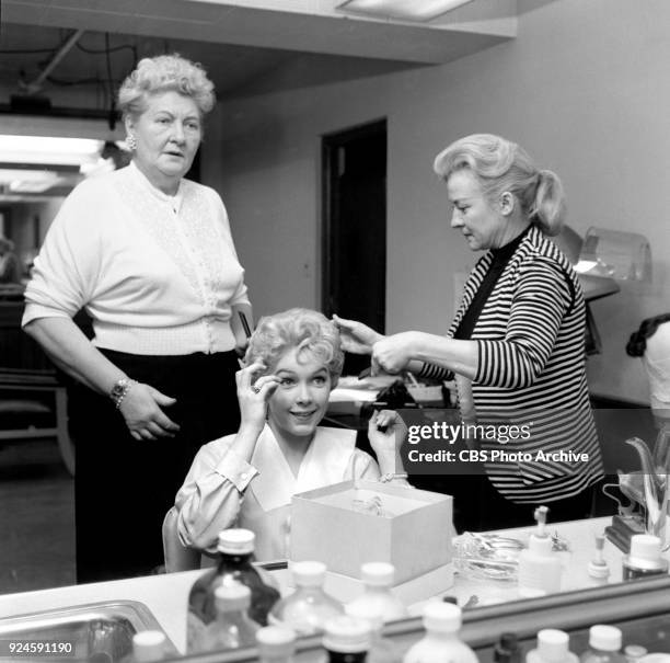 Television program, Alfred Hitchcock Presents. Episode: Craig's Will. Standing at left, hair stylist Florence Bush, works on actress Stella Stevens...