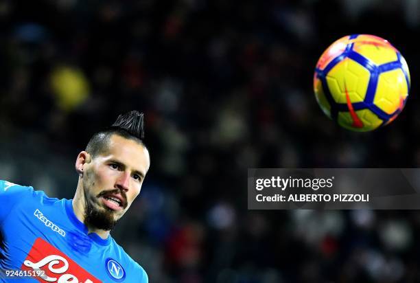 Napoli's Slovakian midfielder Marek Hamsik eyes the ball during the Italian Serie A football match between Cagliari and Napoli at Sardinia stadium in...