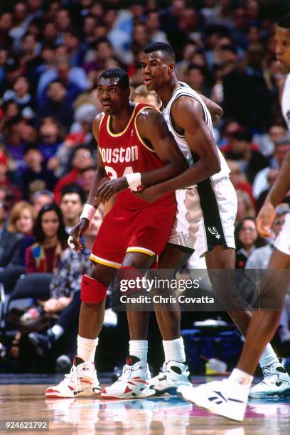 Hakeem Olajuwon of the Houston Rockets posts up during a game played on December 21, 1993 at the Alamodome in San Antonio, Texas. NOTE TO USER: User...