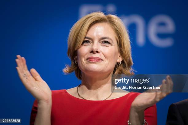 Julia Kloeckber, designated German Minister for Agriculture, clap her hands at the 30th German Christian Democrats party congress on February 26,...