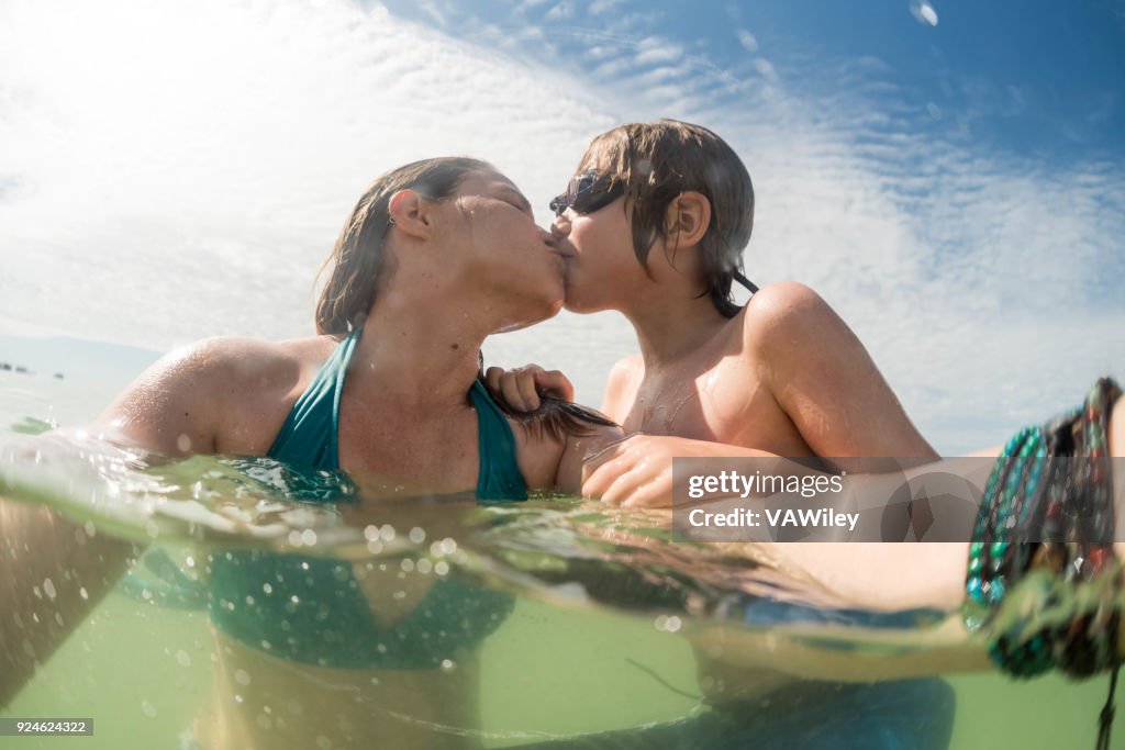 Kissing mother and son in Florida