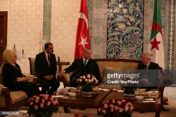 President of Turkey Recep Tayyip Erdogan meets President of the Algerian Senate, Abdelkader Bensalah after an official welcoming ceremony at Houari...