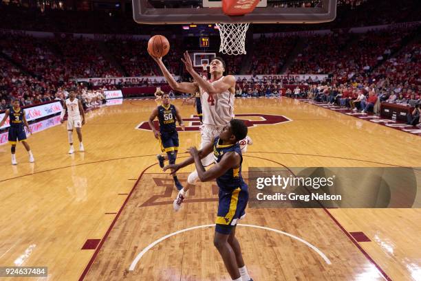 Oklahoma Jamuni McNeace in action vs West Virginia Lamont West at Lloyd Noble Center. Norman, OK 2/26/2018 CREDIT: Greg Nelson