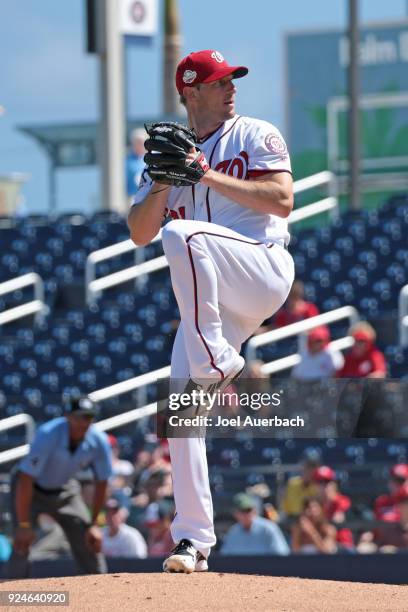 Max Scherzer of the Washington Nationals throws the ball against the Atlanta Braves during a spring training game at The Ballpark of the Palm Beaches...