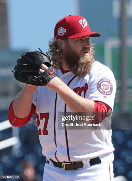 Shawn Kelley of the Washington Nationals looks into home plate for a signal against the Atlanta Braves during a spring training game at The Ballpark...