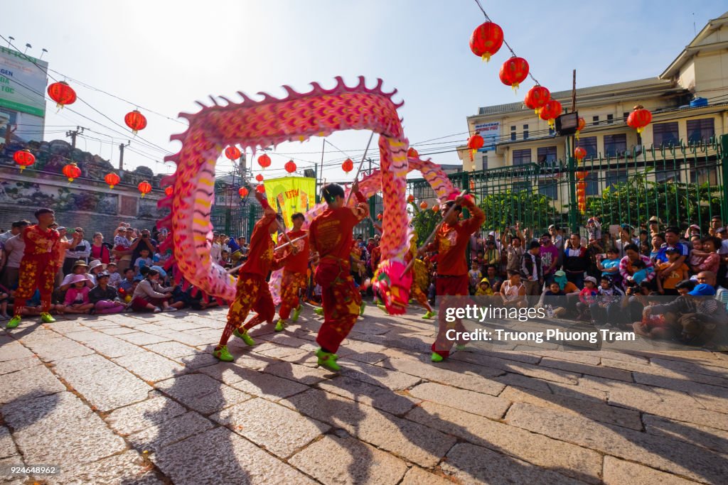 Dragon and lion dance show in Lunar New Year festival, Viet Nam
