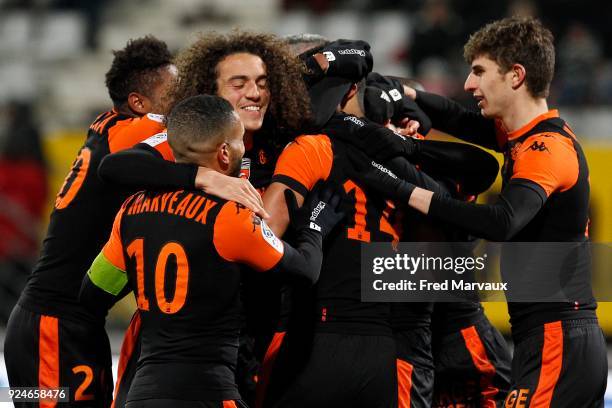 Matteo Guendouzi of Lorient and Sylvain Marveaux of Lorient and Vincent Le Goff of Lorient celebrates scoring his goal during the Ligue 2 match...