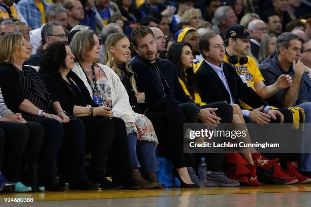 Former Golden State Warriors player David Lee and his fiancée Caroline Wozniacki watch the game between the Oklahoma City Thunder and the Golden...