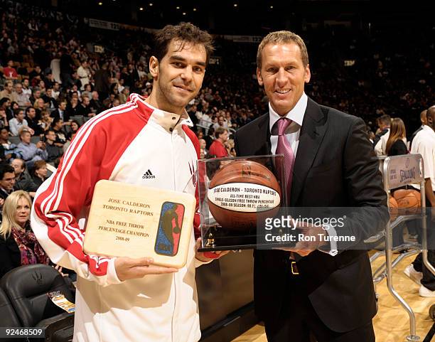 Jose Calderon of the Toronto Raptors accepts the award for the NBA Free Throw Champion for the 2008/2009 season handed to him by General Manager...