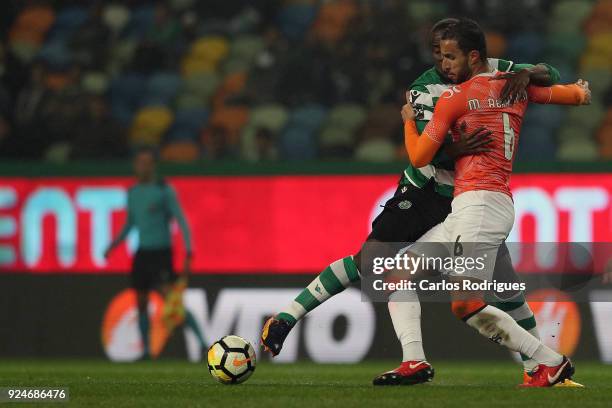 Sporting CP forward Seydou Doumbia from Ivory Coast vies with Moreirense FC defender Mohamed Aberhoune from Morrocos for the ball possession during...