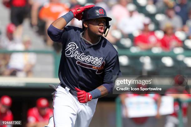 Ronald Acuna Jr. Of the Braves hustles down to first base during the spring training game between the Washington Nationals and the Atlanta Braves on...