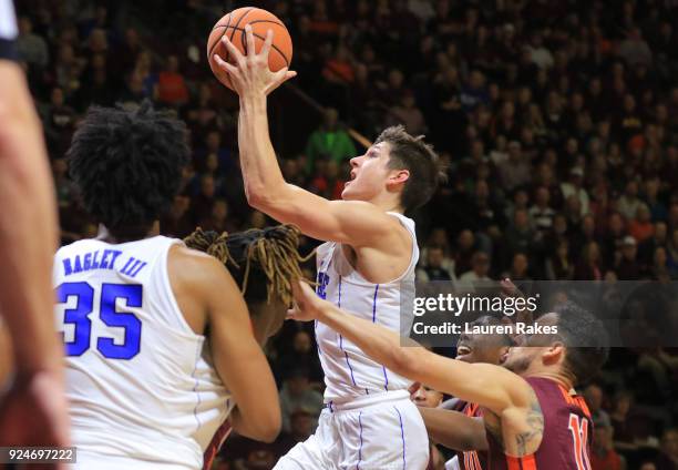 Grayson Allen of the Duke Blue Devils shoots against the Virginia Tech Hokies in the first half at Cassell Coliseum on February 26, 2018 in...