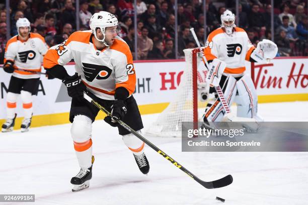 Philadelphia Flyers Defenceman Brandon Manning gains control of the puck while looking on his left during the Philadelphia Flyers versus the Montreal...