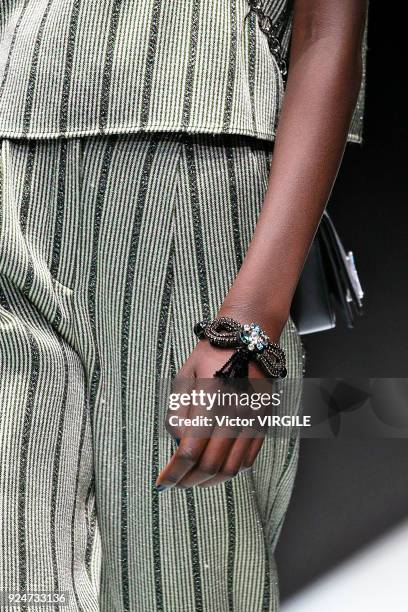 Model walks the runway at the Emporio Armani Ready to Wear Fall/Winter 2018-2019 fashion show during Milan Fashion Week Fall/Winter 2018/19 on...