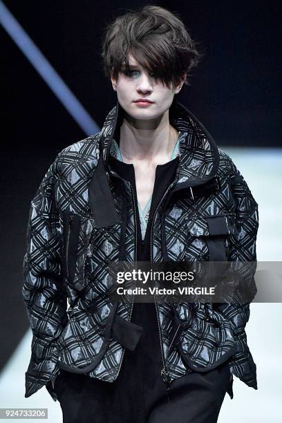 Model walks the runway at the Emporio Armani Ready to Wear Fall/Winter 2018-2019 fashion show during Milan Fashion Week Fall/Winter 2018/19 on...