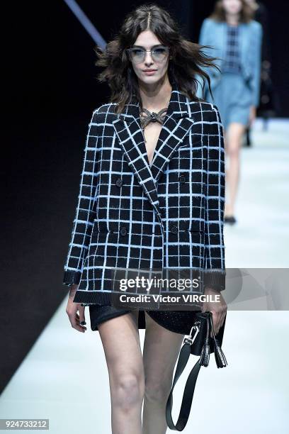 Model walks the runway at the Emporio Armani Ready to Wear Fall/Winter 2018-2019 fashion show during Milan Fashion Week Fall/Winter 2018/19 on...