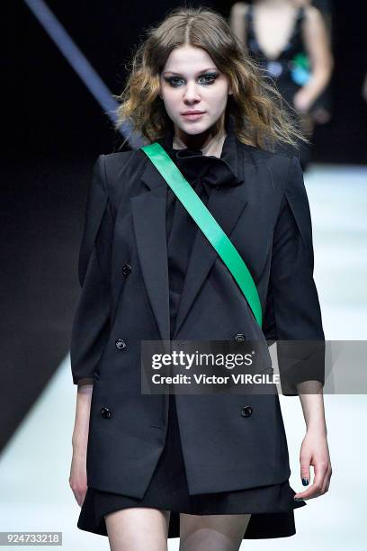 Model walks the runway at the Emporio Armani Ready to Wear Fall/Winter 2018-2019 fashion show during Milan Fashion Week Fall/Winter 2018/19 on...