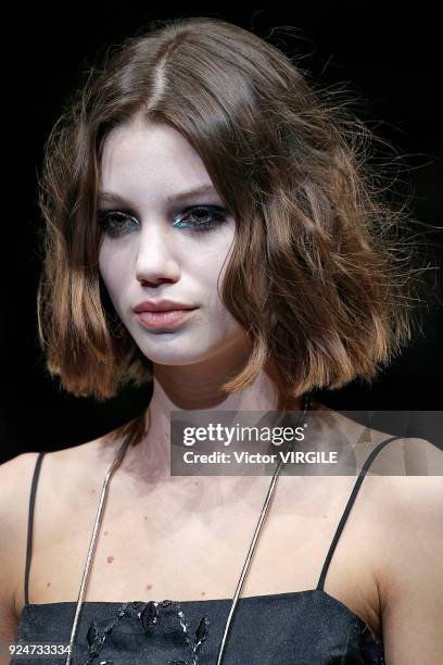 Model walks the runway at the Emporio Armani Ready to Wear Fall/Winter 2018-2019 fashion show during Milan Fashion Week Fall/Winter 2018/19 on...