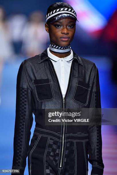 Model walks the runway at the Tommy Hilfiger Ready to Wear Spring/Summer 2018 fashion show during Milan Fashion Week Fall/Winter 2018/19 on February...