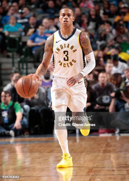 Joe Young of the Indiana Pacers handles the ball against the Dallas Mavericks on February 26, 2018 at the American Airlines Center in Dallas, Texas....