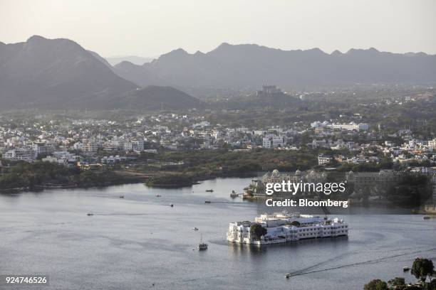 Taj Lake Palace hotel standing in Lake Pichola is seen from the Karni Mata temple complex in Udaipur, Rajasthan, India, on Saturday, Feb. 24, 2018....