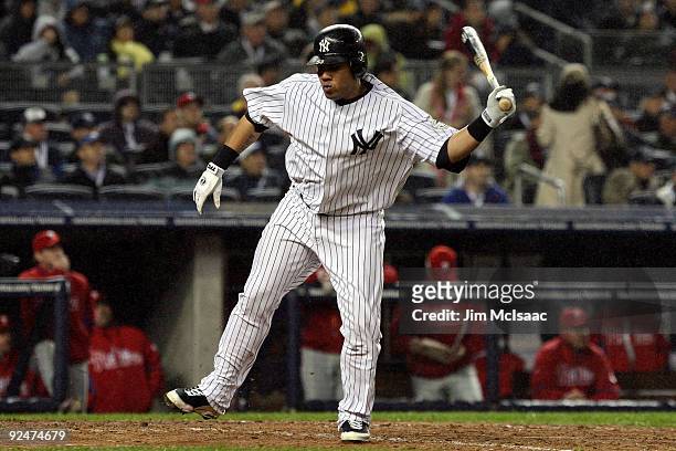 Melky Cabrera of the New York Yankees reacts after he flied out in the bottom of the sixth inning against the Philadelphia Phillies in Game One of...