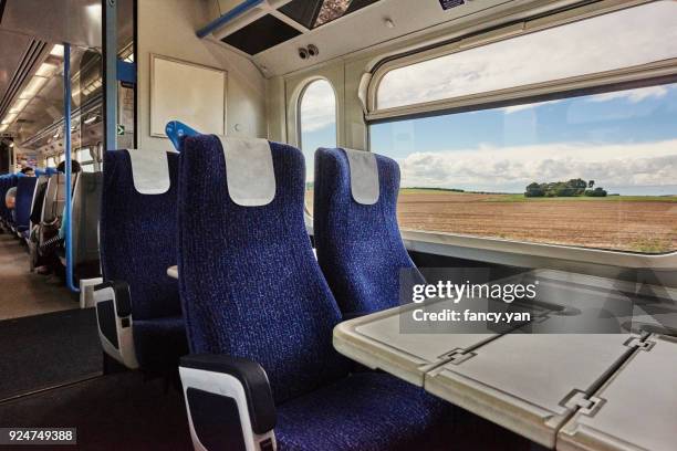 close up of seat in the railway carriage - vehicle seat foto e immagini stock