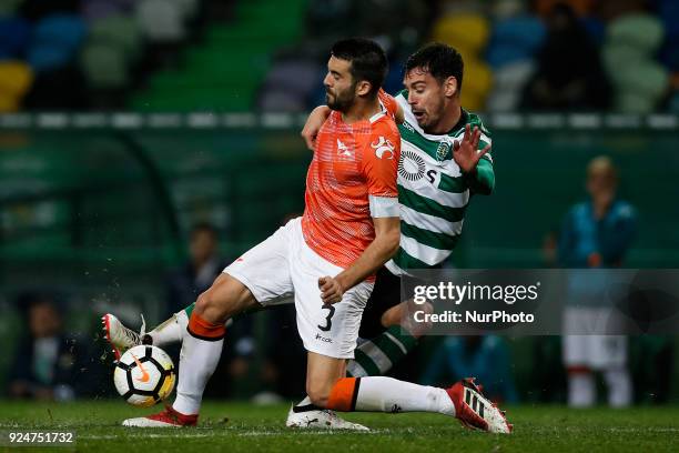 Moreirense's defender Andre Micael vies for the ball with Sporting's defender Andre Pinto during Primeira Liga 2017/18 match between Sporting CP vs...