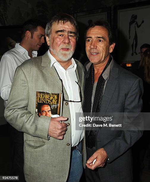 Writer Alan Bleasdale and actor Robert Lindsay attend Robert Lindsay's book launch for 'Letting Go' at the Haymarket Hotel on October 28, 2009 in...