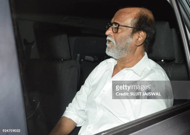 Indian Bollywood actor Rajinikanth arrives at the home of Anil Kapoor following the death of the actress Sridevi Kapoor in Mumbai on February 26,...