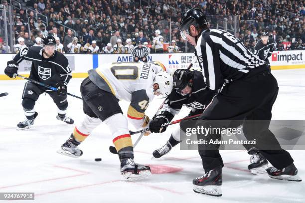 Torrey Mitchell of the Los Angeles Kings faces off against Ryan Carpenter of the Vegas Golden Knights at STAPLES Center on February 26, 2018 in Los...