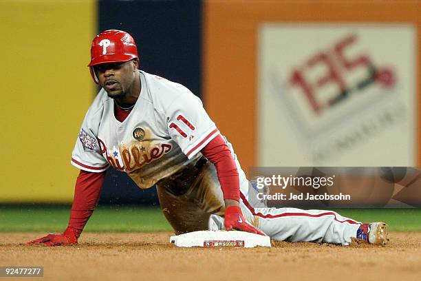 Jimmy Rollins of the Philadelphia Phillies looks on after he stole second base in the top of the eighth inning against the New York Yankees in Game...