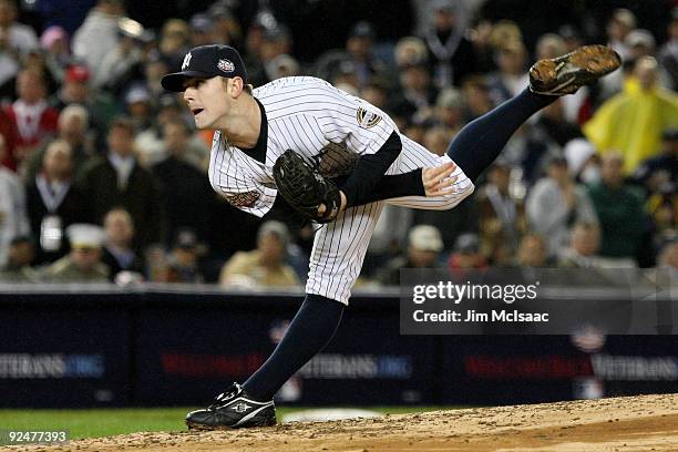 David Robertson of the New York Yankees throws a pitch against the Philadelphia Phillies in Game One of the 2009 MLB World Series at Yankee Stadium...