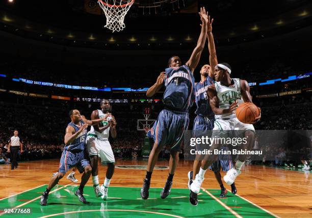 Rajon Rondo of the Boston Celtics looks to make a pass in the lane against Derrick Brown of the Charlotte Bobcats on October 28, 2009 at the TD...