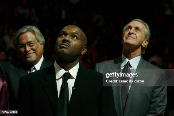 Heat Owner Micky Arison, Heat Legend Tim Hardaway and Heat President Pat Riley participate in the Tim Hardaway Jersey Retirement Ceremony on October...