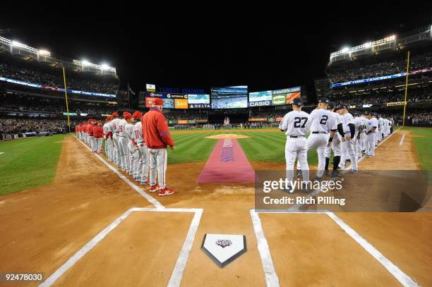 The Philadelphia Phillies and the New York Yankees line up on the field prior to Game 1 of the 2009 World Series between the Philadelphia Phillies...