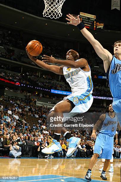 Chauncey Billups of the Denver Nuggets goes to the basket against the Utah Jazz on October 28, 2009 at the Pepsi Center in Denver, Colorado. NOTE TO...