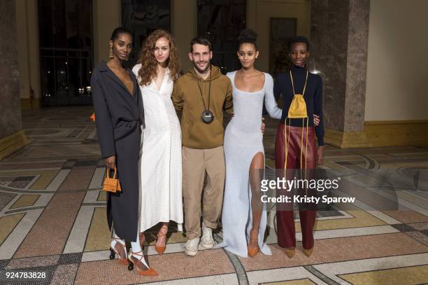 Designer Simon Porte Jacquemus poses with models backstage before the Jacquemus show as part of Paris Fashion Week Womenswear Fall/Winter 2018/2019...
