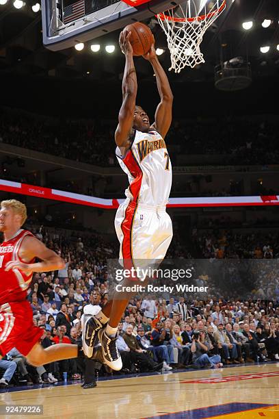 Kelenna Azubuike of the Golden State Warriors dunks the ball against the Houston Rockets on October 28, 2009 at Oracle Arena in Oakland, California....