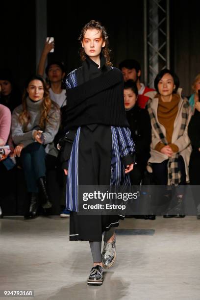 Model walks the runway at the Ujoh show during Milan Fashion Week Fall/Winter 2018/19 on February 26, 2018 in Milan, Italy.