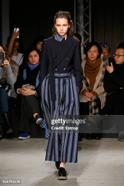 Model walks the runway at the Ujoh show during Milan Fashion Week Fall/Winter 2018/19 on February 26, 2018 in Milan, Italy.