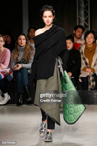 Model walks the runway at the Ujoh show during Milan Fashion Week Fall/Winter 2018/19 on February 26, 2018 in Milan, Italy.