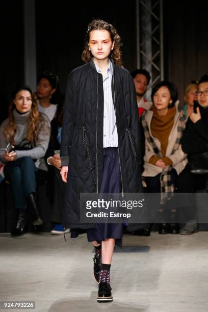 Model walks the runway at the Ujoh show during Milan Fashion Week Fall/Winter 2018/19 on February 26, 2018 in Milan, Italy.