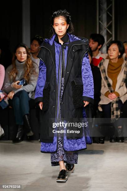 Model walks the runway at the Ujoh show during Milan Fashion Week Fall/Winter 2018/19 on February 26, 2018 in Milan, Italy.