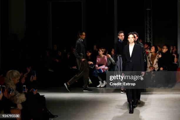 Model walks the runway at the Ujoh show during Milan Fashion Week Fall/Winter 2018/19 on February 26, 2018 in Milan, Italy.