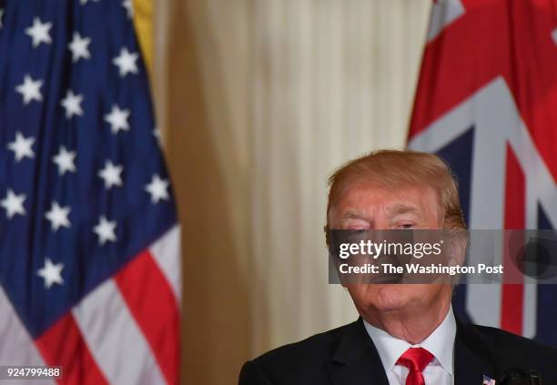 President Donald Trump pauses while participating in a joint press conference with Australian Prime Minister Malcolm Turnbull, not pictured, at The...