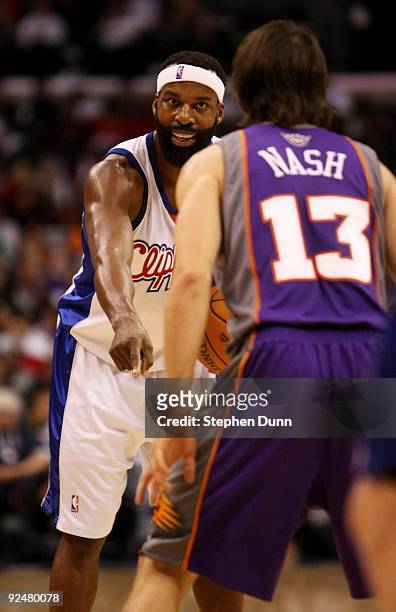 Baron Davis of the Los Angeles Clippers signals as Steve Nash of the Phoenix Suns defends on October 28, 2009 at Staples Center in Los Angeles,...